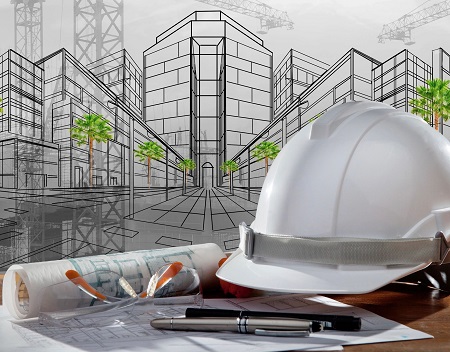 A white hard hat sitting on top of a table.